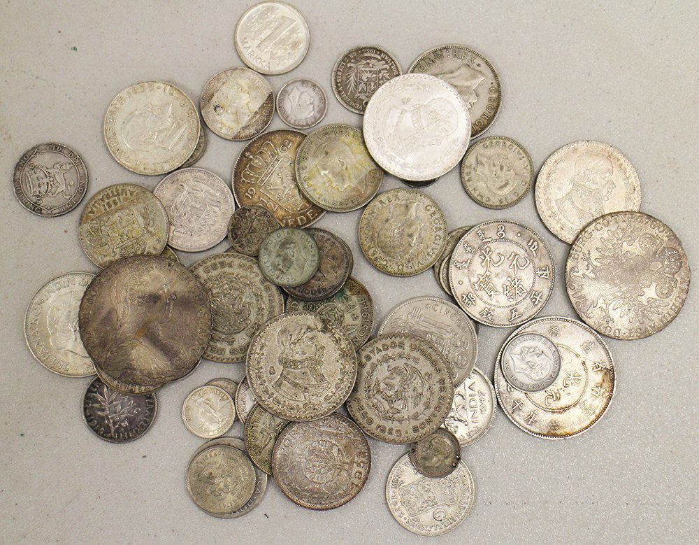 16+ OUNCES OF SILVER WORLD COINS (1 of 1)