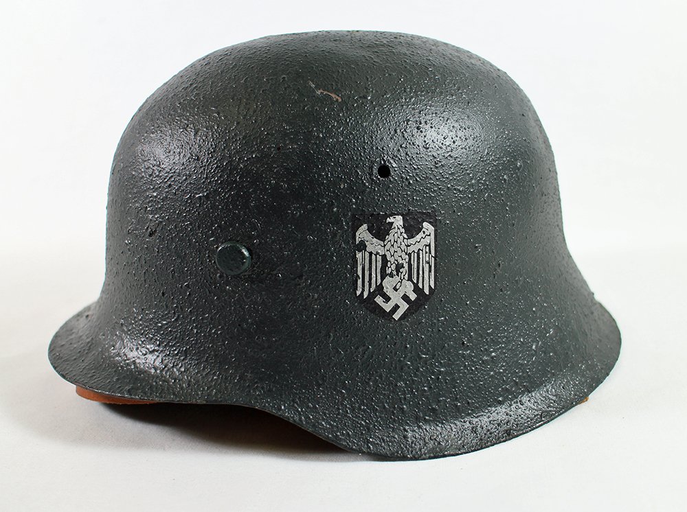 WWII GERMAN MILITARY HELMET: WWII era German military helmet with swastika decal.