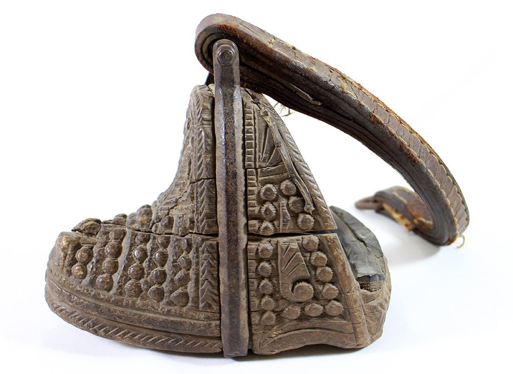 FOLK ART SCANDINAVIAN WOOD STIRRUP: Antique carved wooden shoe mitt stirrup. Approx 9 1/2" x 8" with a leather strap.