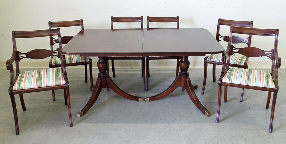 DUNCAN PHYFE STYLE DINING TABLE & CHAIRS: Duncan Phyfe style dining room table with six chairs (two armchairs). Includes one leaf. Table 29 3/4" tall 62" x 42" wide. Leaf adds 12." Chairs with Morgantown Furniture label. Also included are cus