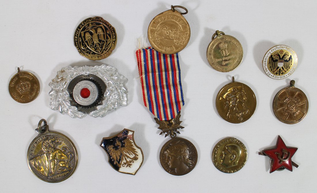 WWI WWII GERMAN MEDALS & AWARDS: Includes a WWI Hesse Darmstadt Army service award, a French Republic Medal P. Tasset inscribed Joseph Simler 1933, a Soviet M 35 star cockade w/ hammer & sickle cap visor, an aluminum Ges Gesch Laurel
