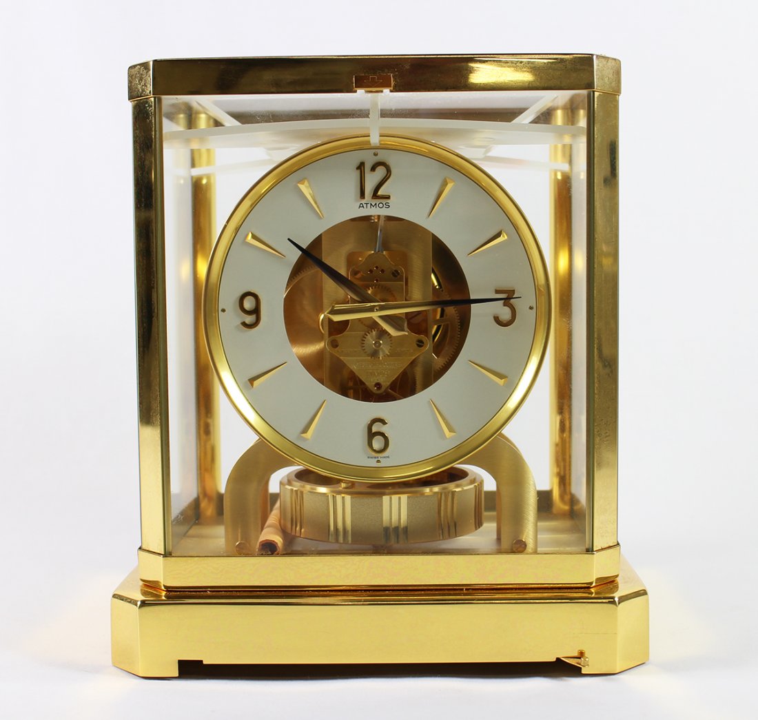 JAEGER LeCOULTRE ATMOS CLOCK: New, never used Jaeger Le Coultre Atmos clock. Brass & glass case. Serial number 538463. 9 1/4" tall 8 1/4" x 6 1/4" wide.