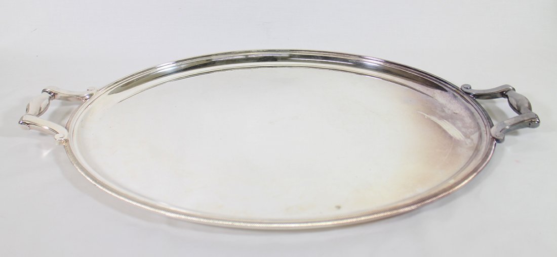 CHRISTOFLE SERVING TRAY: Christofle France silverplate serving platter with original tarnish pouch. 24 3/4" w/ handle x 16 1/2" wide.