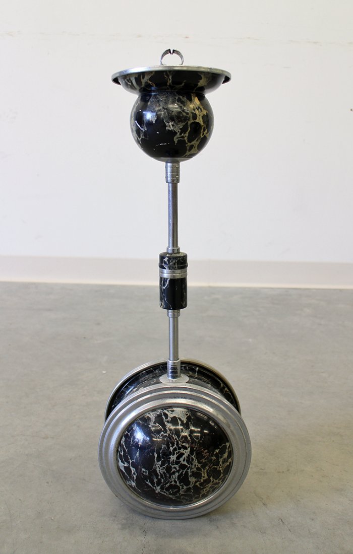 ART DECO ROLLING SMOKING STAND: Art Deco "rolling" smoking stand with movable rolling ball at bottom to balance stand. Match holder at top. Top pushes down to empty ashtray. 24" tall. Rollodor by Belmet.