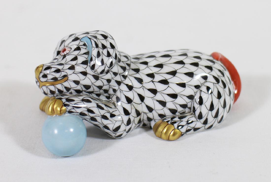 HEREND FISHNET DOG W/ BALL: Herend black fishnet dog with ball figurine. 3.5" wide.