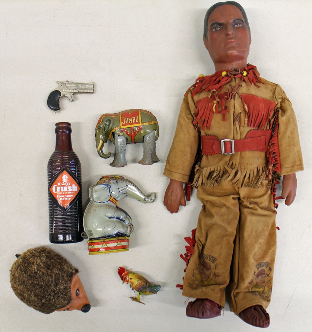 VINTAGE TIN LITHO TOYS & MORE: Includes a J. Chein litho elephant bank, a Lehmann Jumbo wind up elephant US Zone Germany, a Nunu 936 hedgehog toy, toy Derringer cap gun, a Kohler Pecking Hen Cockerel, and a Lone Ranger Tonto doll.