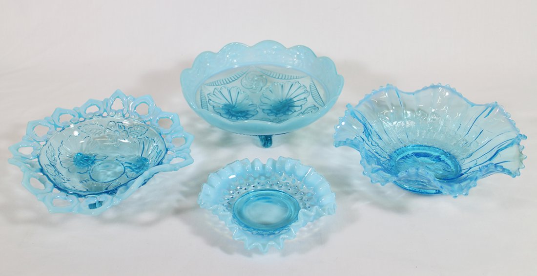 ANTIQUE BLUE OPALESCENT BOWLS: Includes a Northwood Peacocks on the Fence bowl, a Northwood ruffles with rings and daisy, hobnail and reticulated edge bowl. 8" to 5 1/2" wide.