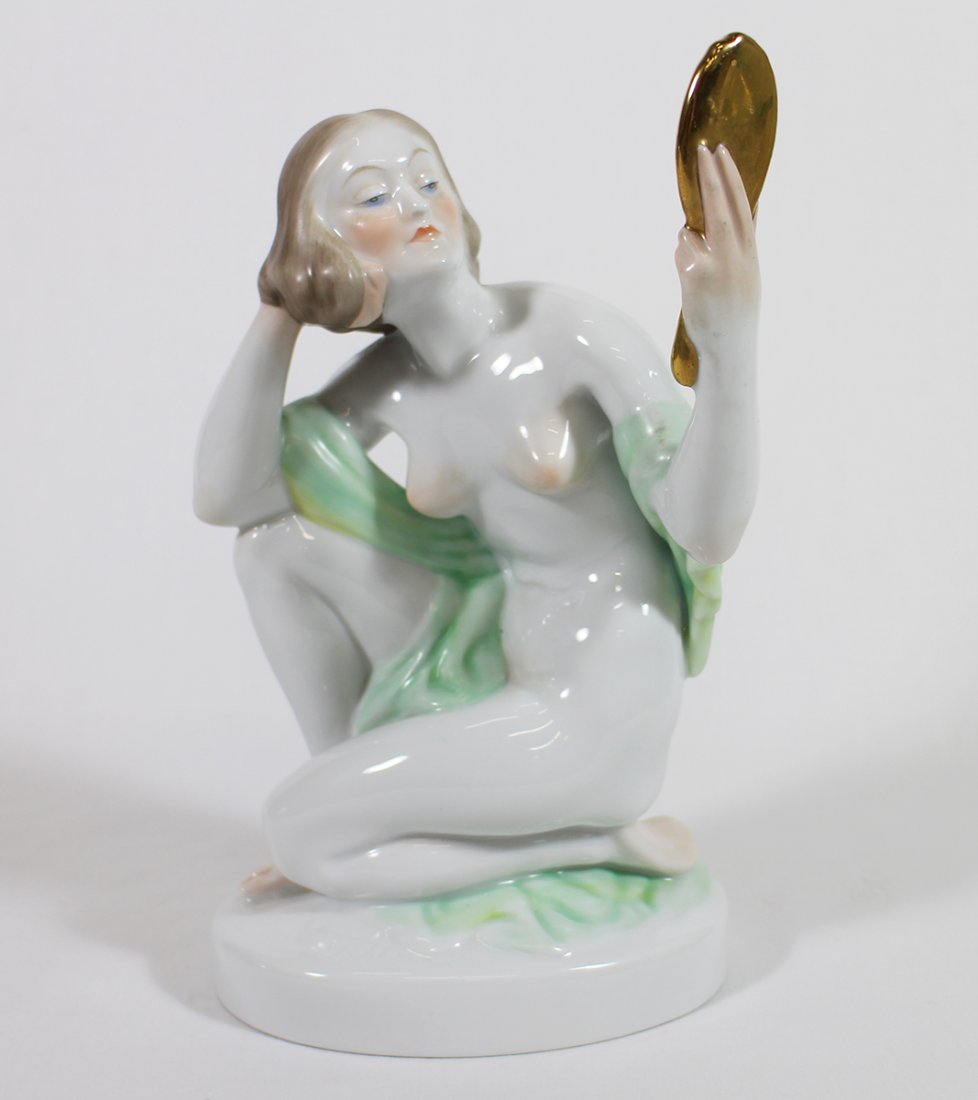 HEREND NUDE WOMAN W/ MIRROR FIGURINE: Herend Art Deco style figurine of a nude woman holding mirror. 9" tall.