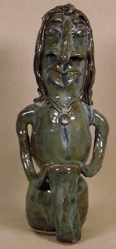 659 - Matherne Pottery: SOULFUL SAM. Sculpture of drummer. Blue, green. 16 x 6 x 7 in. Donated by Lisa Mills Matherne.