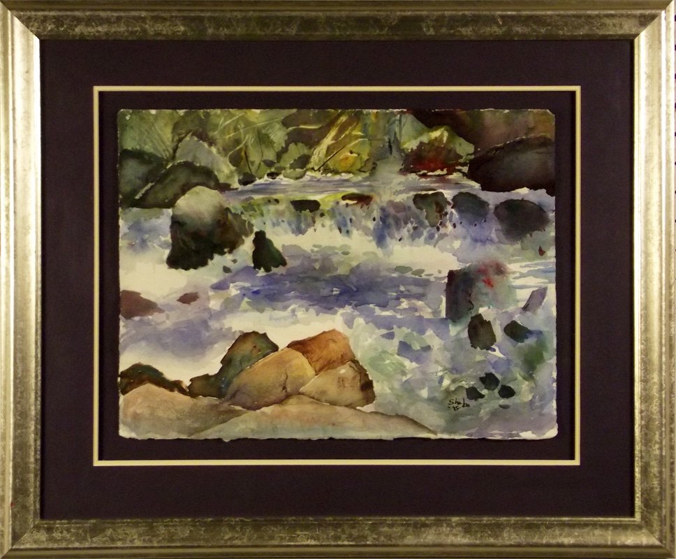 797 - Mortillaro W/C: UNTITLED. Watercolor of mountain stream. Blue, brown, green. Signed. Dated '95. 19 x 23 in. Framed. Donated by Sue Spilsbury.