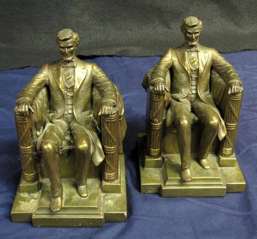 Jennings Brothers Bookends: Pair of copper clad bookends after D.C. French's sculpture of Abraham Lincoln from the Lincoln Memorial. Marked "JB 2440 © D.C. French." 7 inches in height; light wear. 20th-century