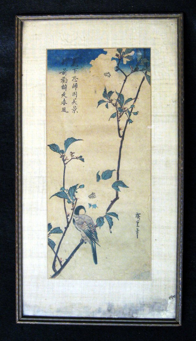 Hiroshige I: Fine early woodblock print by Hiroshige I (Ando), depicting a bird on a tree branch, colored in blues, greens and browns. 14-1/2 x 6-1/2 inches, mounted to silk (stained), in glass-fronted frame; mino