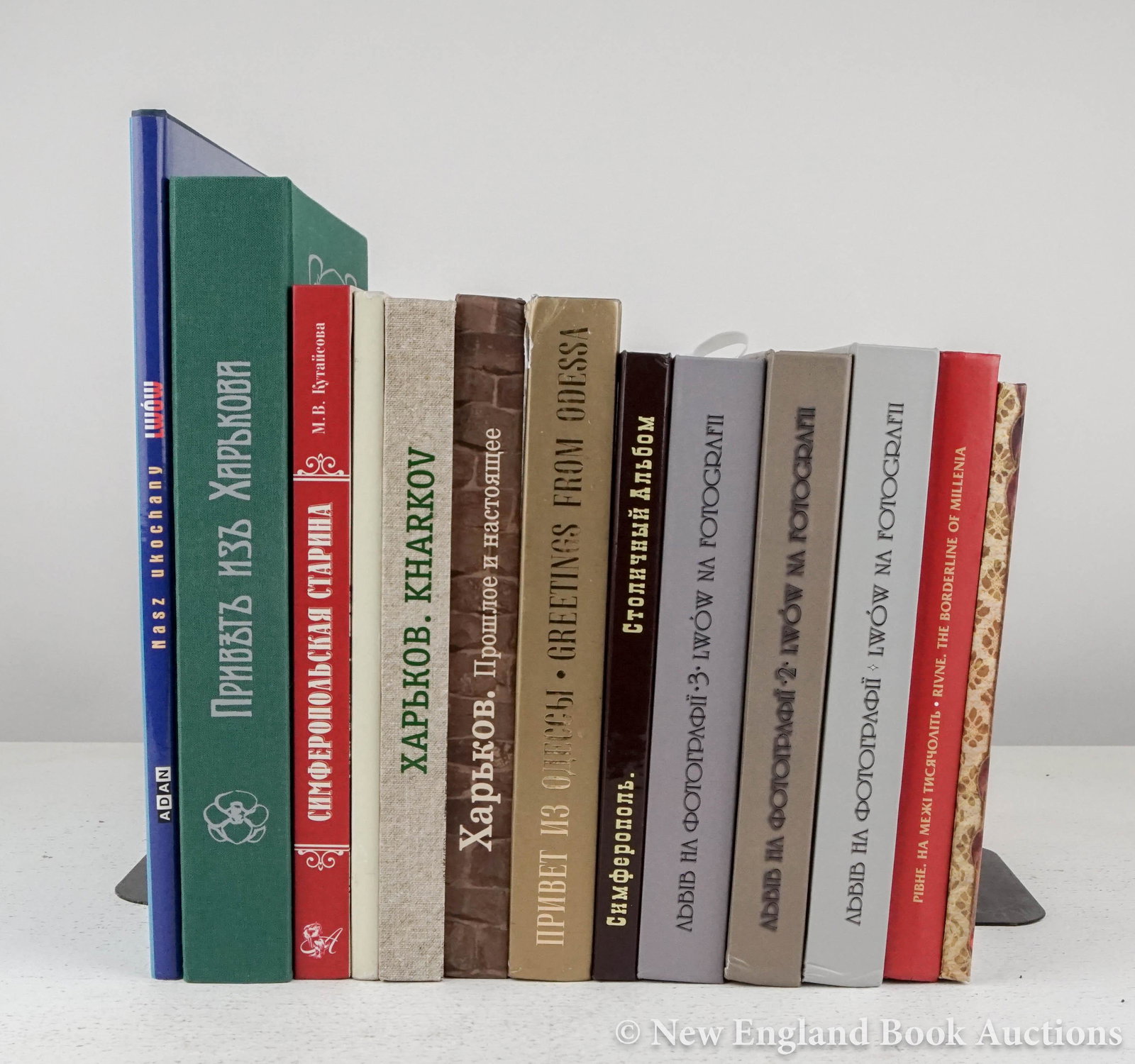 Ukraine: 204. Ukraine. Group of 13 volumes. Illustrated. 4to or 8vo, 12 boards; most light wear. Vp, vd [100/150]Includes: Mikhailov. Kharkov. (2013) * ditto. The Past and the Present. (2014) * Poizner. Greeti