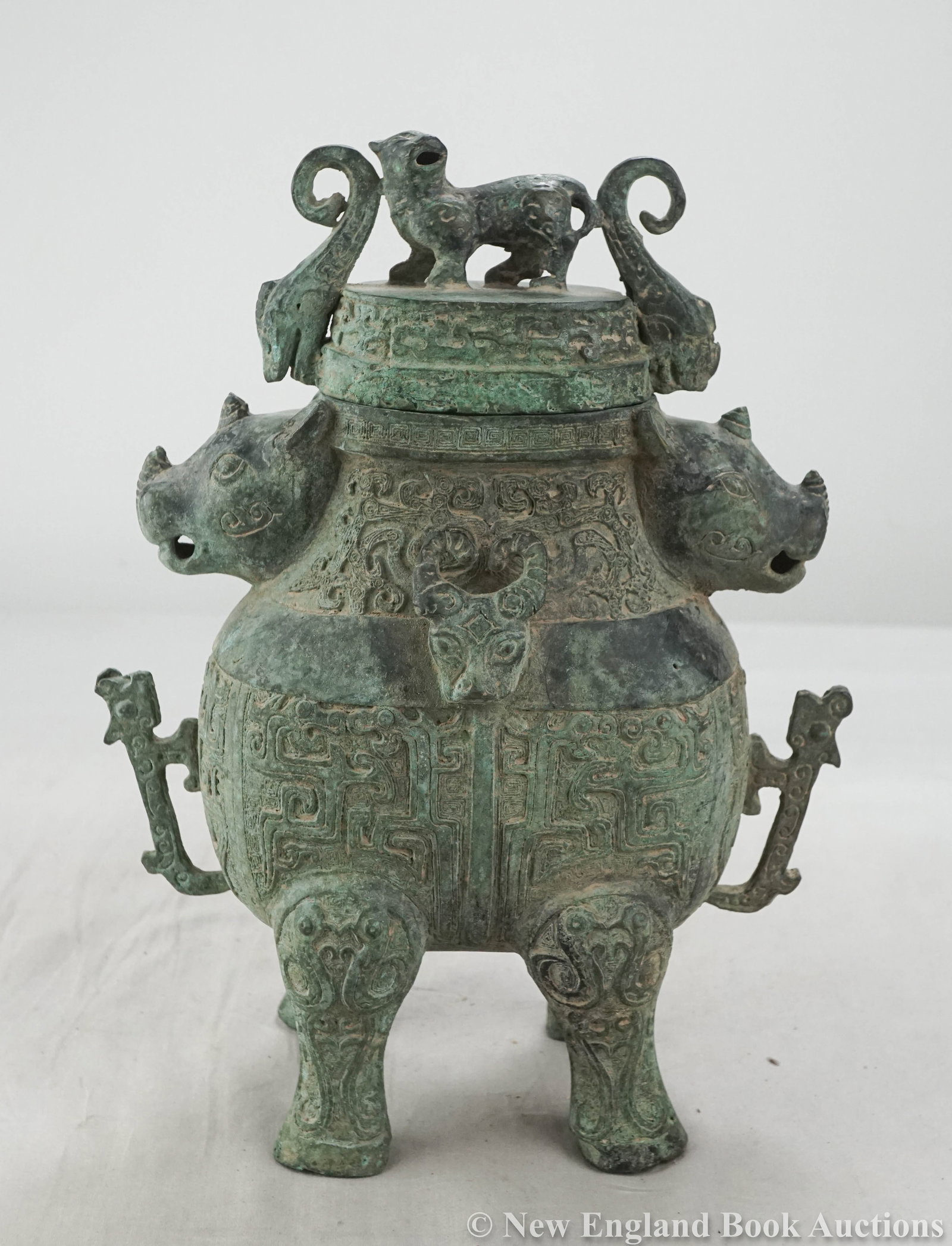 Chinese Bronze: 53. Chinese Bronze. Chinese double Rhinoceros bronze vessel in the style of the Shang or Zhou dynasties. Height 11 inches. China, 19th-century? [80/120]