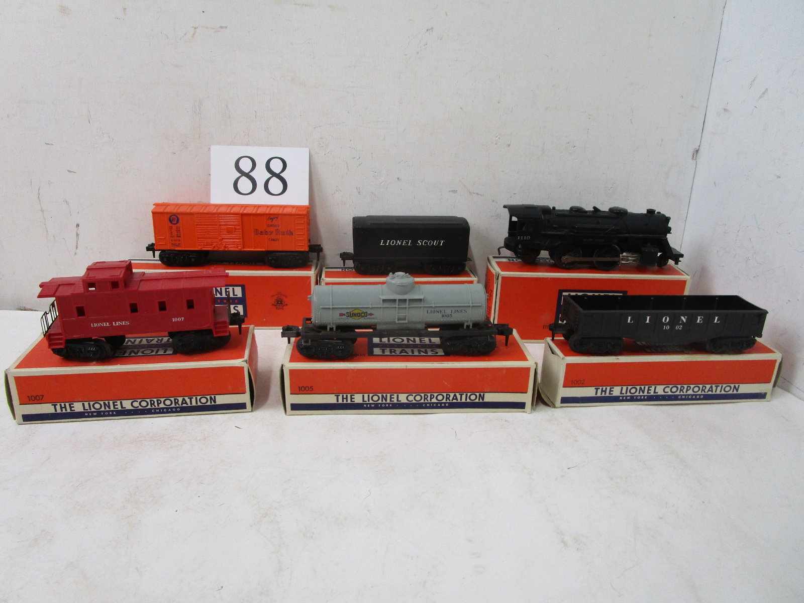 Lionel Train: Lionel #1110 engine, #1001T tender, #1002 gondola car, #1004 box car, #1005 tank car, #1007 caboose, all with original boxes