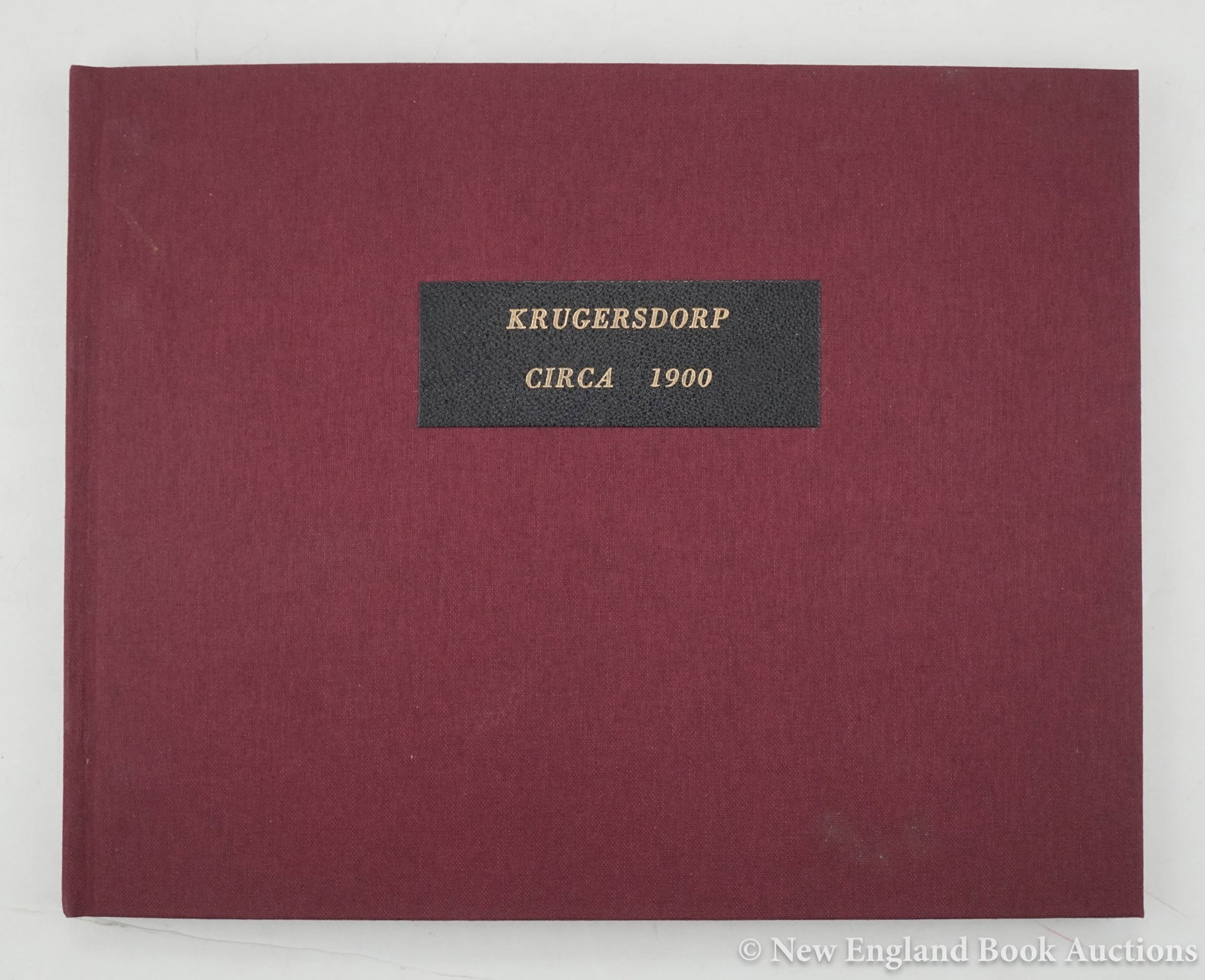 Africa: 1. Africa. Souvenir of the West Rand. Latest Views of Krugersdorp and District. 12 plates from photographs, including several of the gold mines. Oblong 4to, cloth, gilt-lettered leather cover-label, o