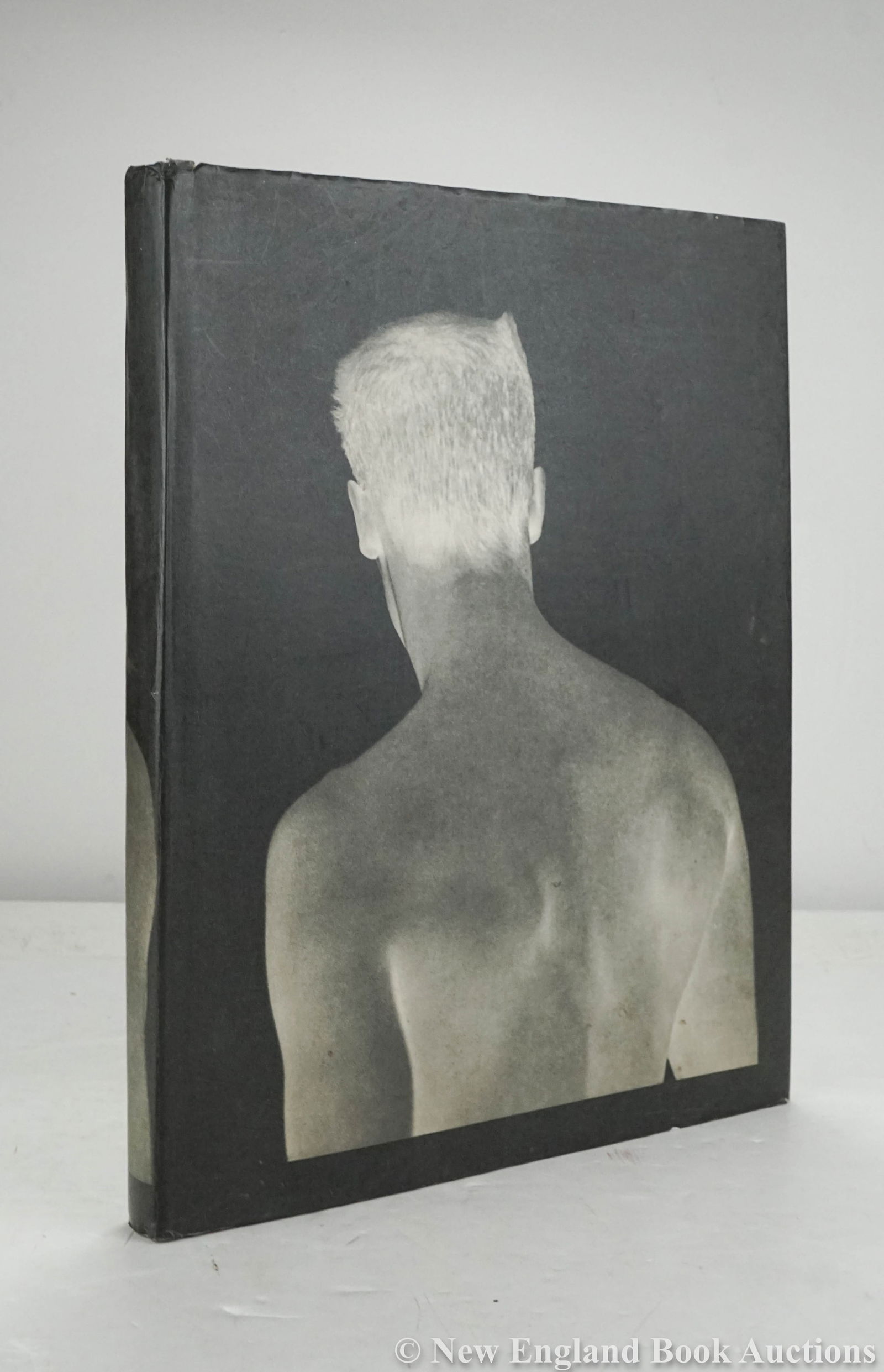 Weber, Bruce: 211. Weber, Bruce. Bruce Weber. Reproductions of Weber's photographs. Folio, cloth, dust jacket (rear panel soiled); light wear. Los Angeles: Twelvetrees Press, 1983 [75/100] FIRST EDITION. Verso of o
