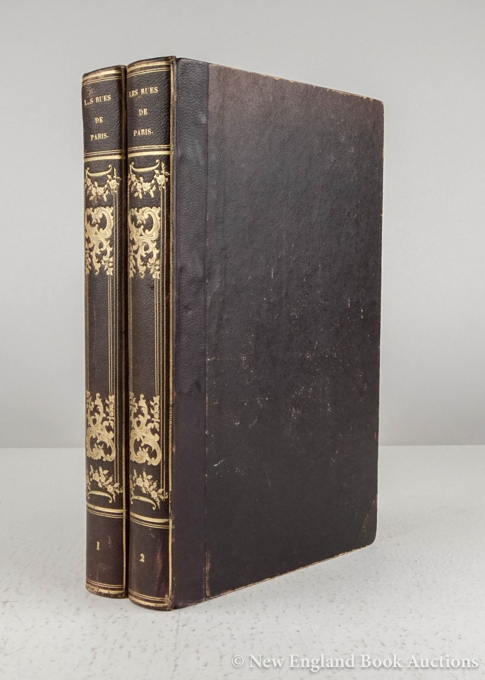 Lurine, Louis: 144. Lurine, Louis,et. al. Les Rues de Paris. Paris Ancien et Moderne. Illustrated. 2 volumes. Tall 8vo, contemporary gilt-decorated leather-backed boards; rubbed, some foxing. Paris, 1844 [100/150] F