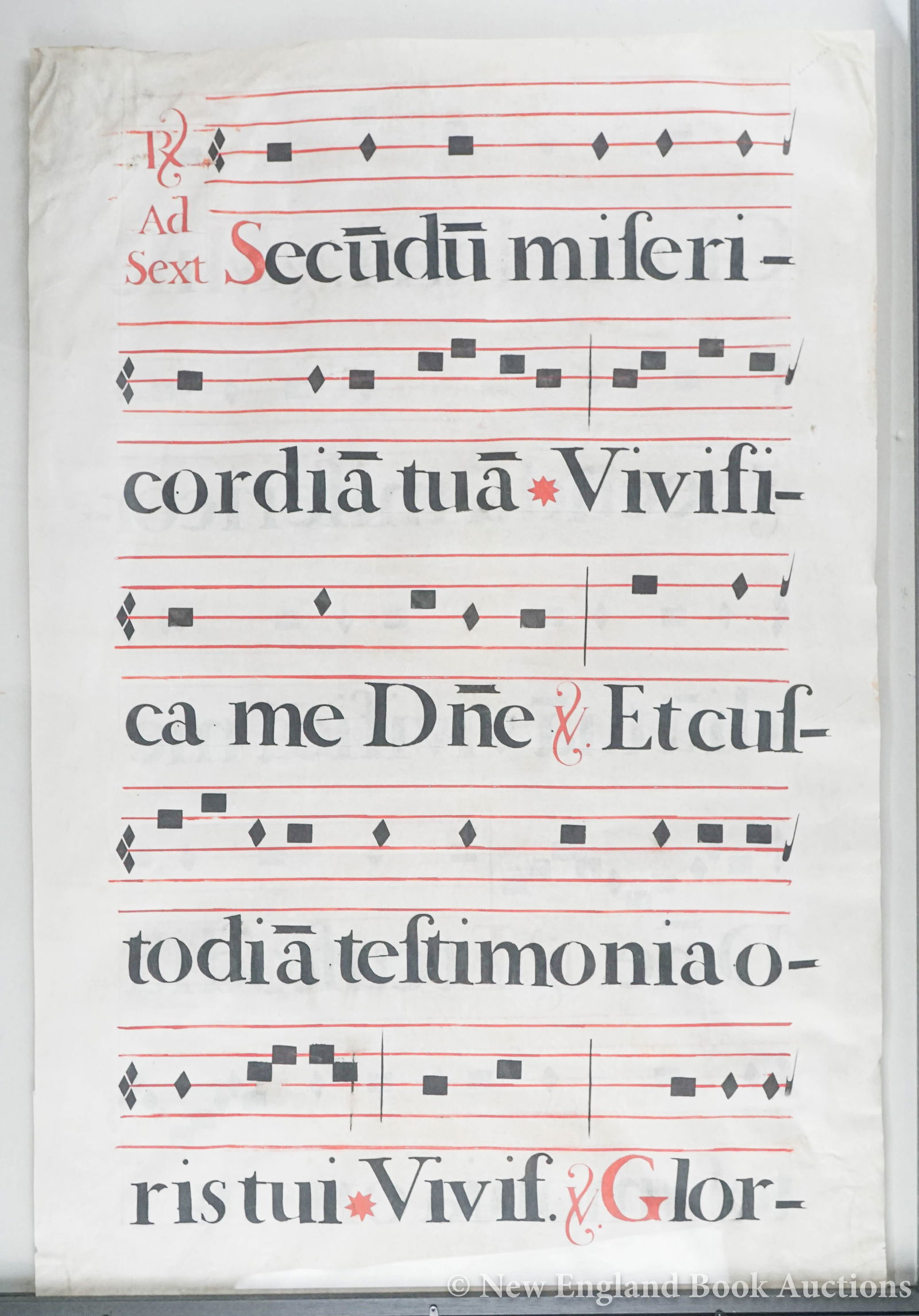 Missal Leaf: 147. Missal Leaf. Five stave leaf in red and black. 29-1/2 x 20 inches, vellum, double-sided glass-fronted frame; 1 corner creased, generally sound. Europe, 17th-century? [250/350]