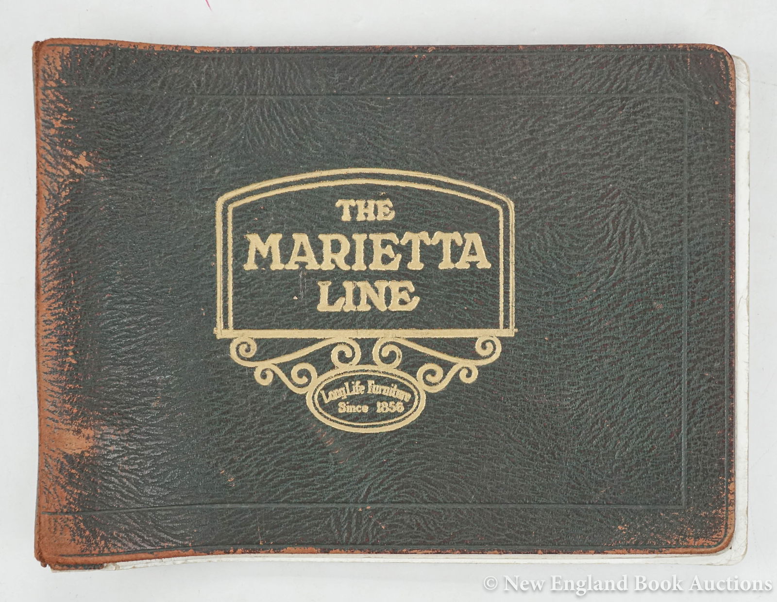 Trade Catalogue: 214. Trade Catalogue. The Marietta Line. Built Up to A Standard Not Down To A Price. 26 photograph illustrations of furniture. Oblong 4to, double-screw leather-back, loose wrap-around leather covers