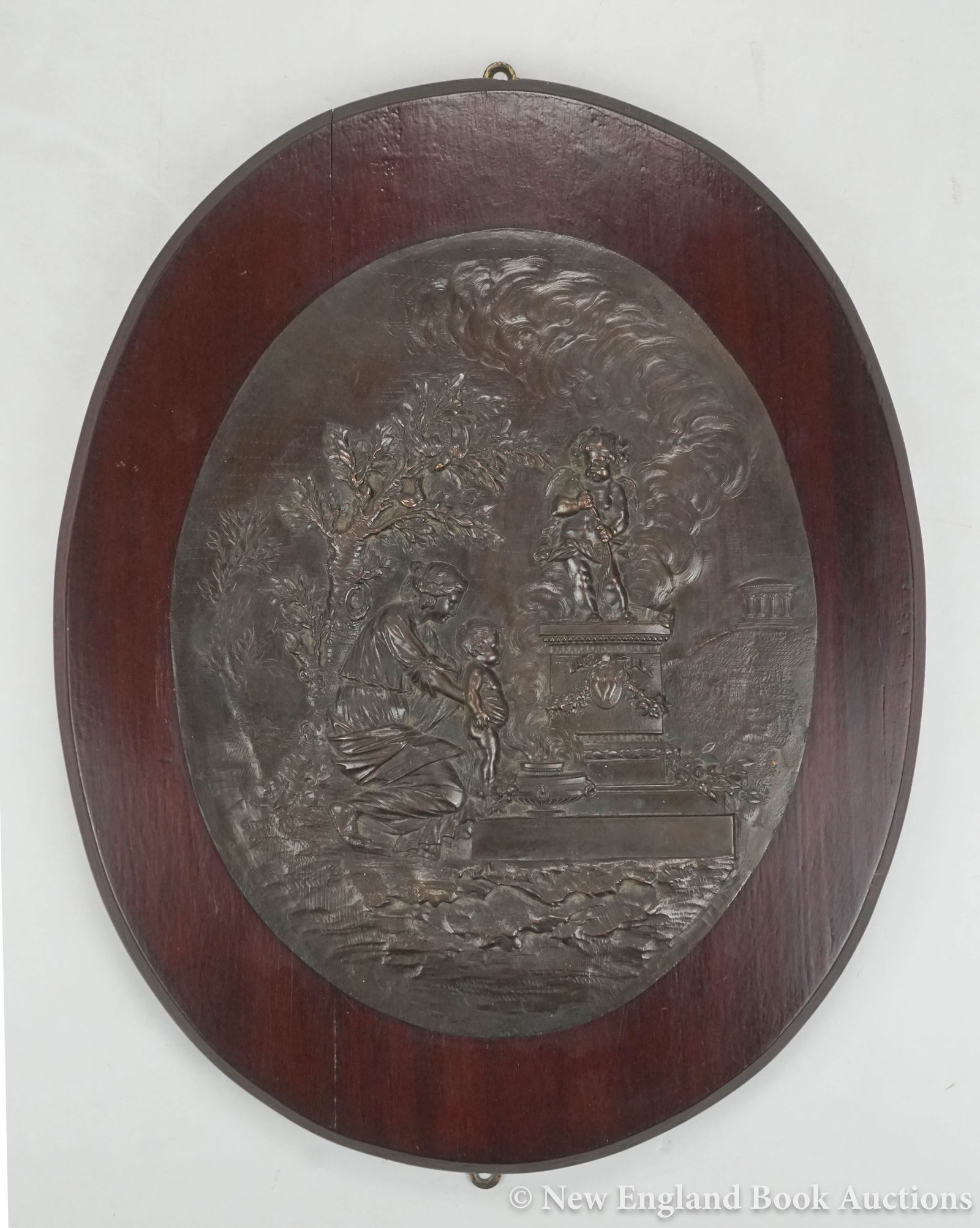 Bronze: 8. Bronze. Bronze memorial plaque. 11-1/4 x 9 inches, mounted to mahogany wood back; light wear. Boston: The Metallic Compress Casting Co. , 19th-century [75/100]