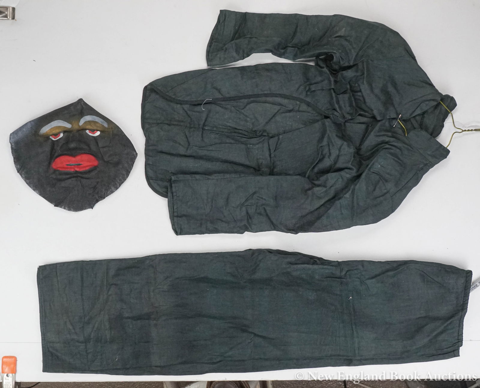 Halloween Costume: 37. Halloween Costume. Boys Racist black costume. Painted mask, string-tied pants (21 inch inseam), tailcoat. American, nd [200/300]