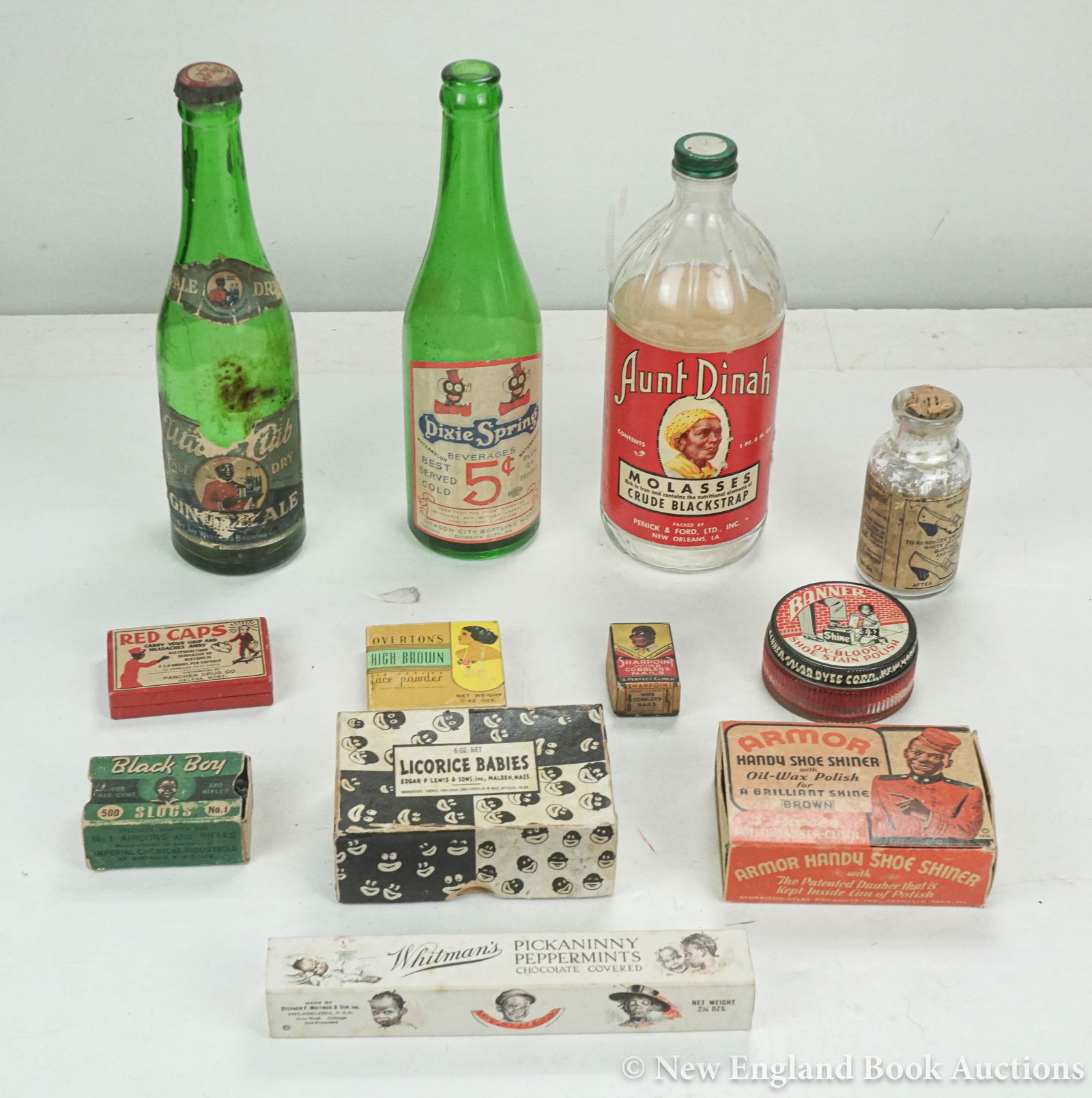 Advertising: 40. Advertising. Collection of 13 boxes, tins, jars or bottles. Most depicting racist images. Various sizes and formats; varying wear. American, 20th-century [75/100]