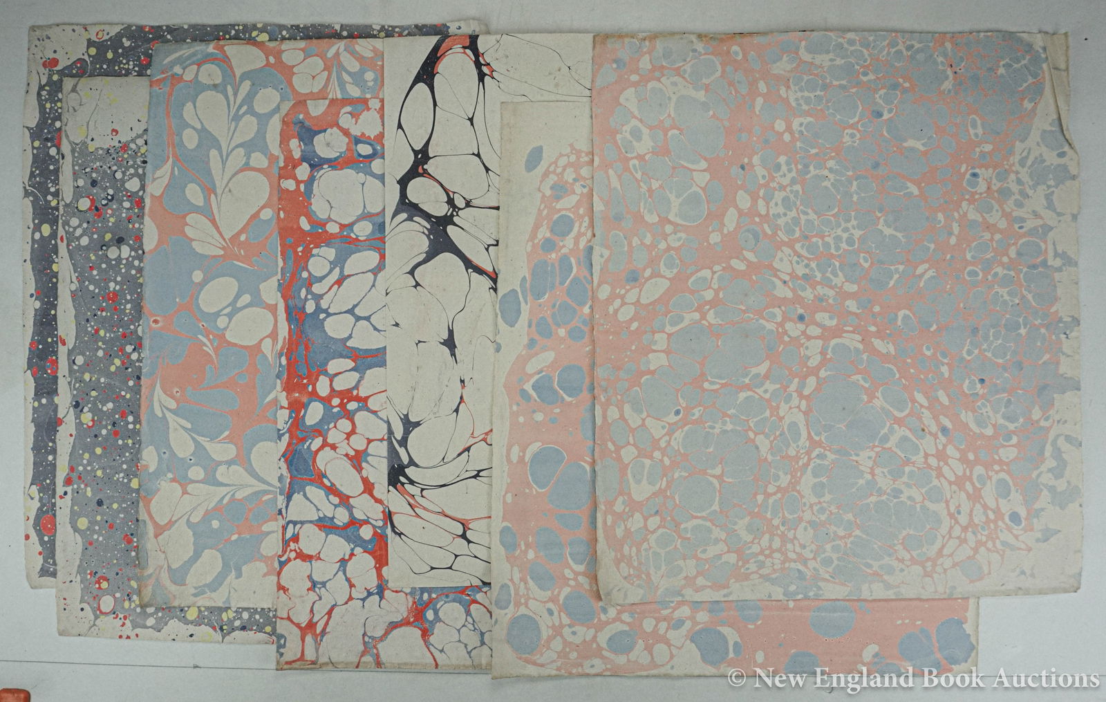 Marbled Paper: 143. Marbled Paper. Group of over 80 hand made sheets. Various designs and colors. Mostly 18 x 14 inches with some scraps; moderate wear. Np, nd [600/900]