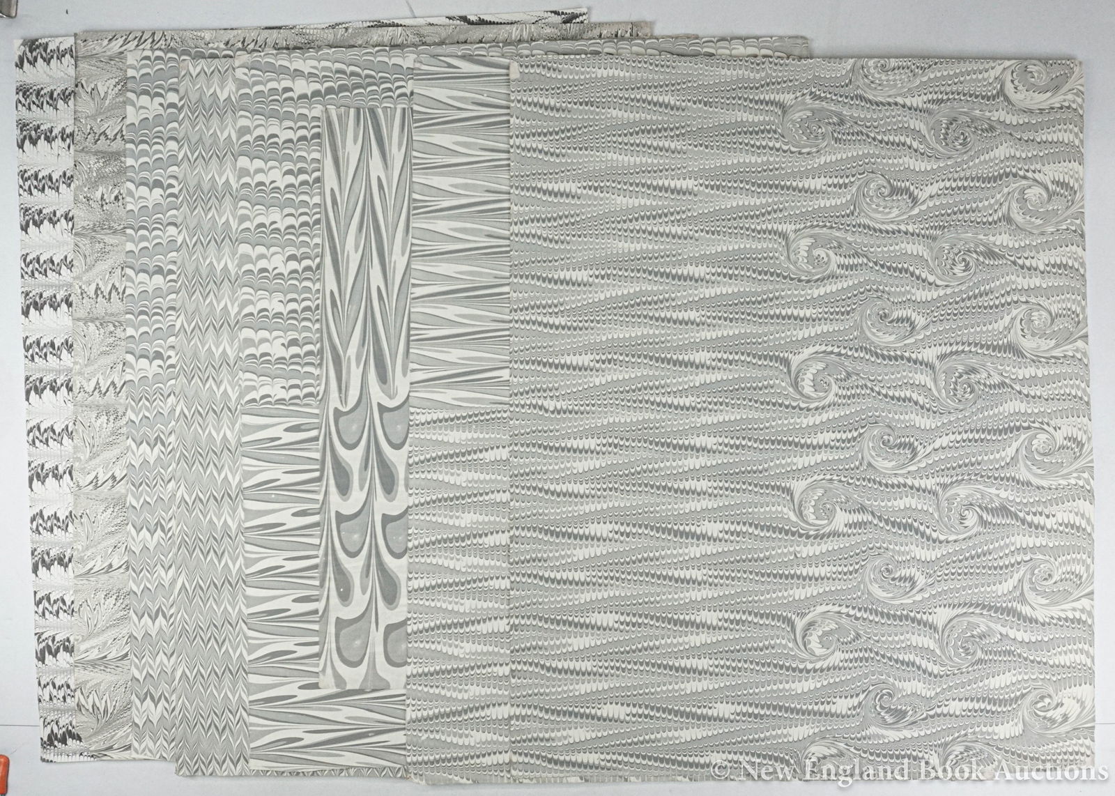 Marbled Paper: 151. Marbled Paper. Collection of 4 sheets. Various designs and colors in several sets of like design and color. Each about 25 x 20 inches; light wear. Np, nd [200/300]