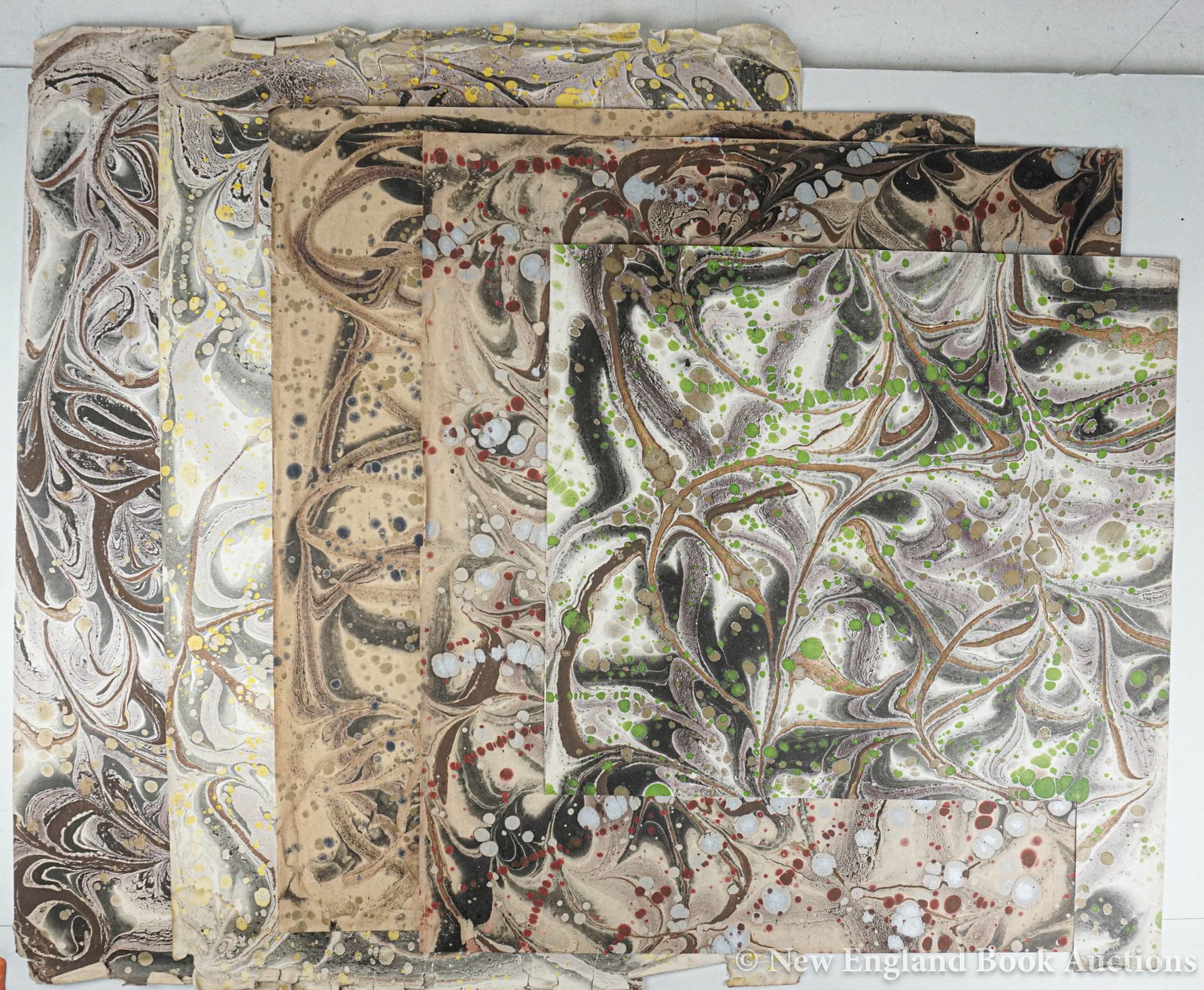 Marbled Paper: 153. Marbled Paper. Group of over 70 sheets. Various designs and colors. Most around 25 x 20 inches, rest smaller or clipped. Np, nd [200/300]