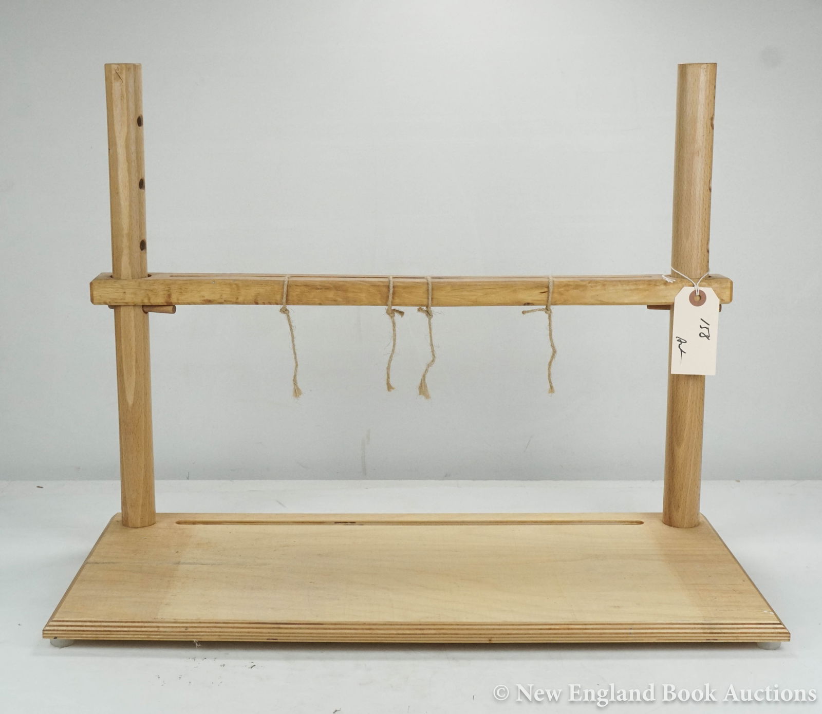 Bookbinding: 158. Bookbinding. Wooden sewing frame. 19-1/2 inches between posts. Overall 23-1/2 x 12 x 17-1/2 inch (post height). Np, nd [75/100]