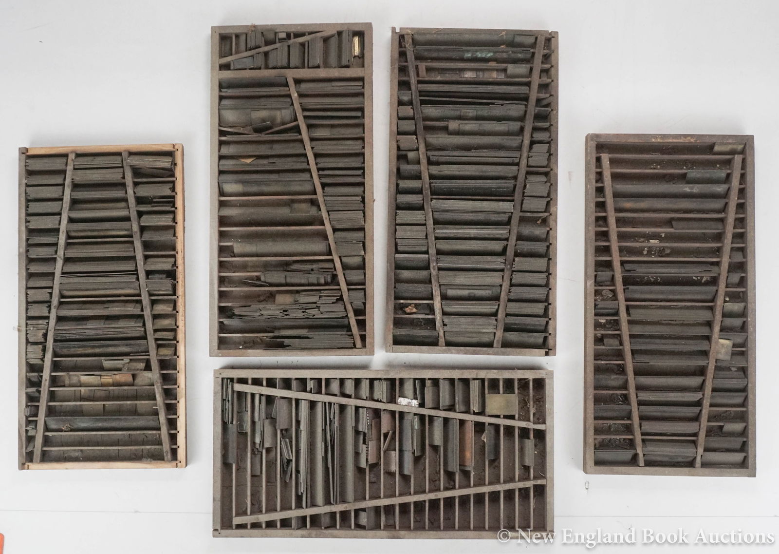 Typesetting Leads: 182. Typesetting Leads. 4 drawers of hundreds of leads plus many loose and unsorted. Most 2pt. Moderate wear. Np, nd [100/150] Includes dozens of misc. 20pt metal type.