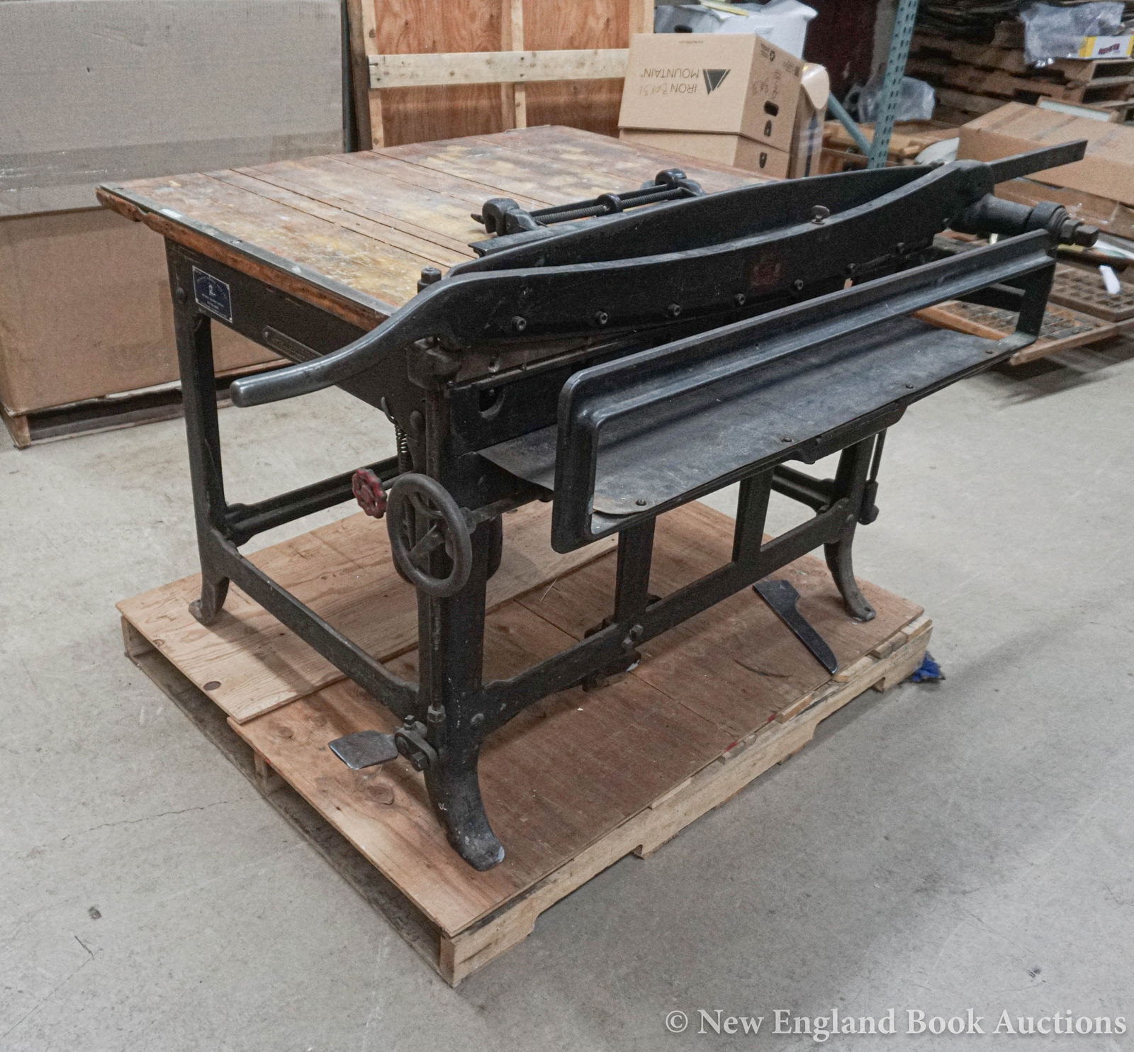 19th-century Cast Cutter: 183. 19th-century Cast Cutter. Edwin B. Stimpson & Son industrial cutter. Cast iron with wooden top. About 42 x 46 x 36 inches; moderate wear, working condition. New York, 1880s [300/500] This