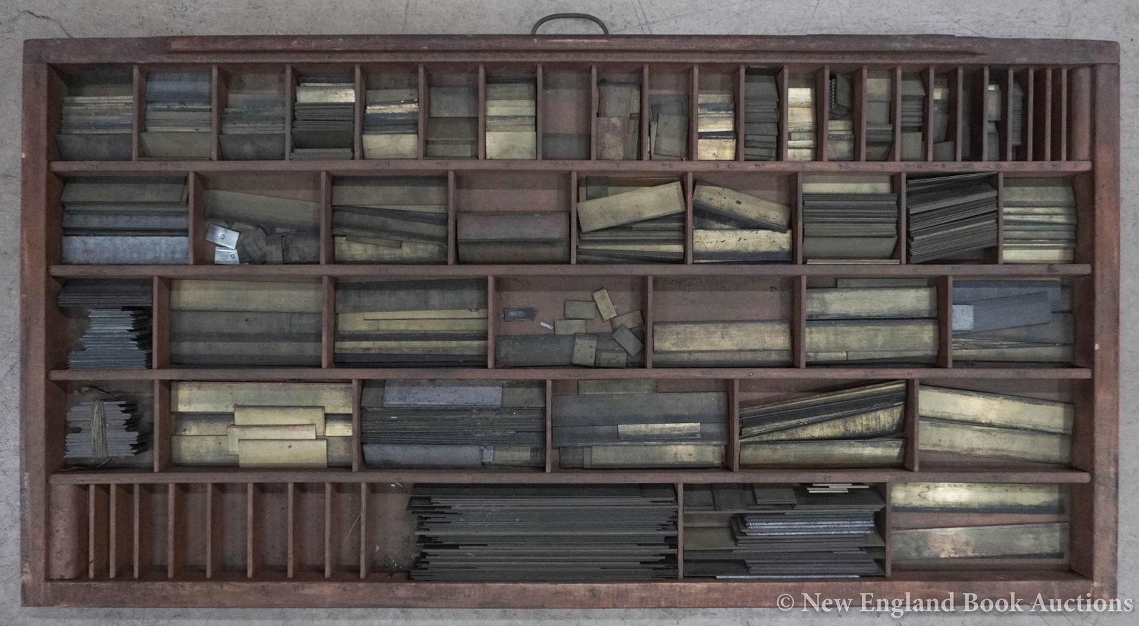 Printing Type: 197. Printing Type. Group of about 1000 typesetting leads and slugs. Various sizes, most brass alloy; moderate wear. Np, nd [125/175]