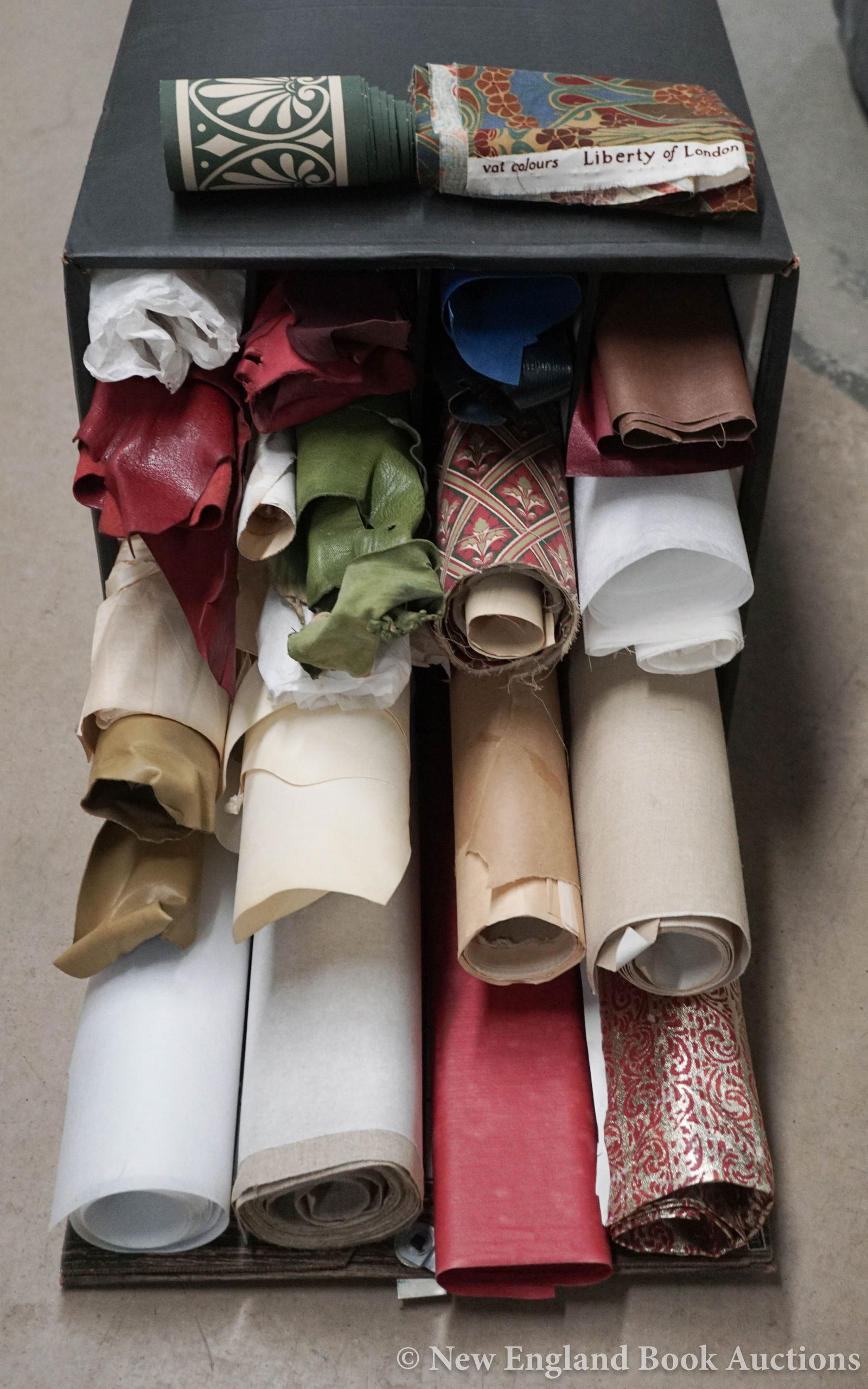 Bookbinding: 221. Bookbinding. Massive group of cloth & paper, patterned and colored, rolled or cut pieces, etc., etc. Np, 20th-century [1000/1500]