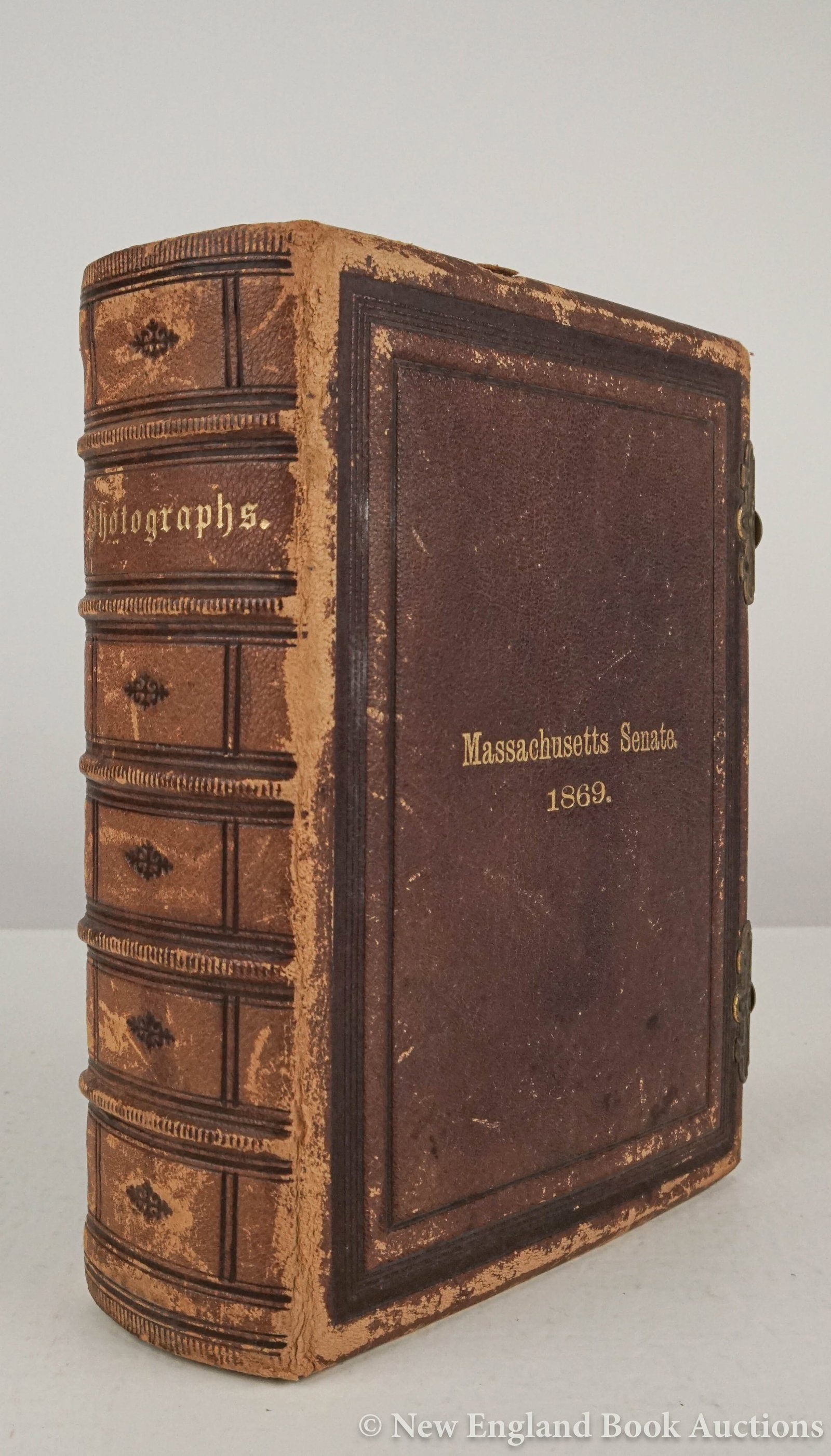 Photography: 136. Photography. Massachusetts Senate. Album of 48 cartes-de-visite. 8vo, contemporary gilt-lettered leather stamped in blind, 2 brass clasps; rubbed, generally sound otherwise. [Boston], 1869 [300/5