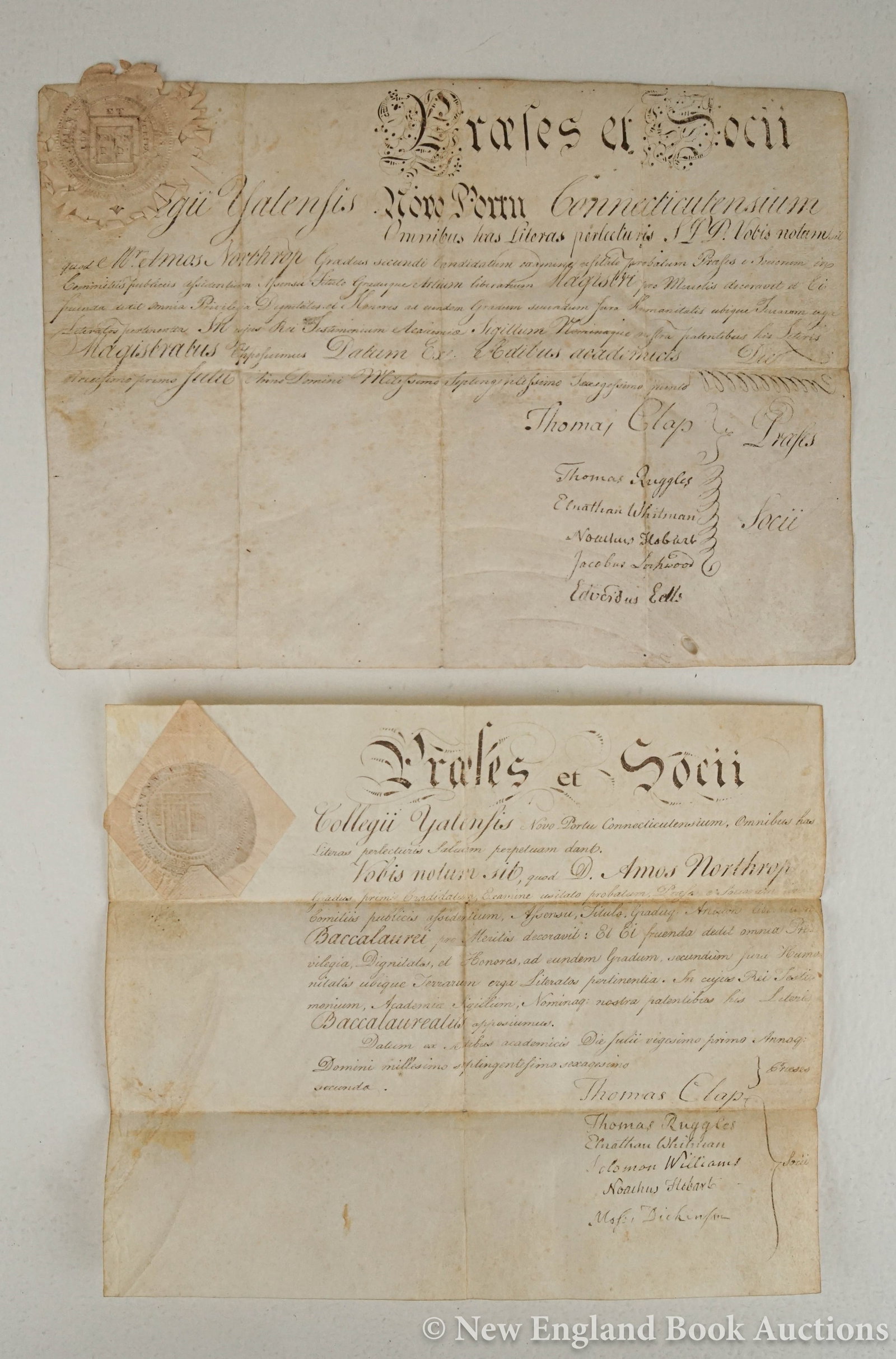 Yale College: 212. Yale College. Northrop, Amos. Manuscript diploma with paper seal. TWO COPIES. Each about 9 x 12 inches, vellum; some soiling. SIGNED BY PRESIDENT THOMAS CLAP. Connecticut, 1762 [75/100] Dexter,