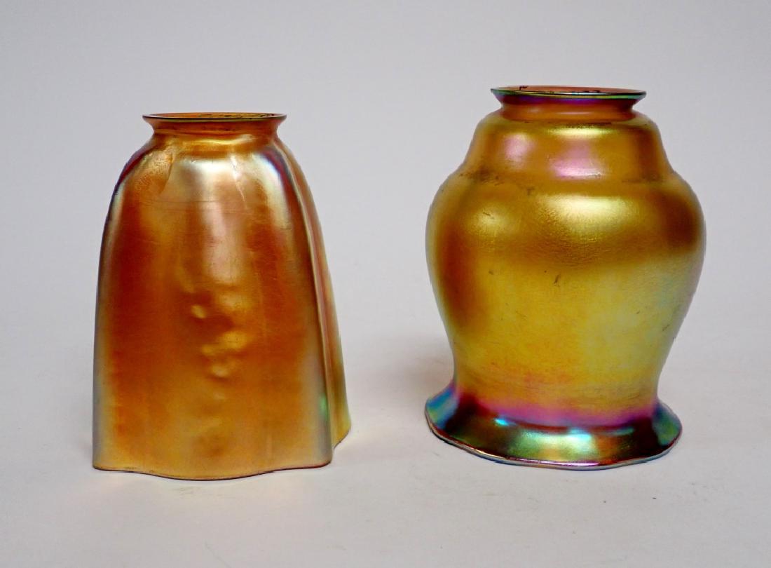 Pair of Aurene Art Glass Shades Signed Quezal: Pair of Aurene Art Glass Shades Signed Quezal. Featuring glossy iridescent finish. Signed "Quezal" on inner top lip. Both shades are different shapes in this lot. Imperfections: signs of normal use, n