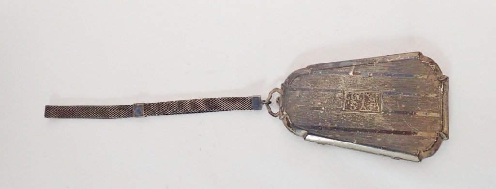 Antique Silver Art Deco Ladies Mirrored Compact: Sterling silver compact with chain handle. embossed / engraved.Hinged case with a herring-bone mesh chain.Marked "W Sterling 787"Watrous Manufacturing Co.Imperfections, age.Height: 7 3/4" (with chain)