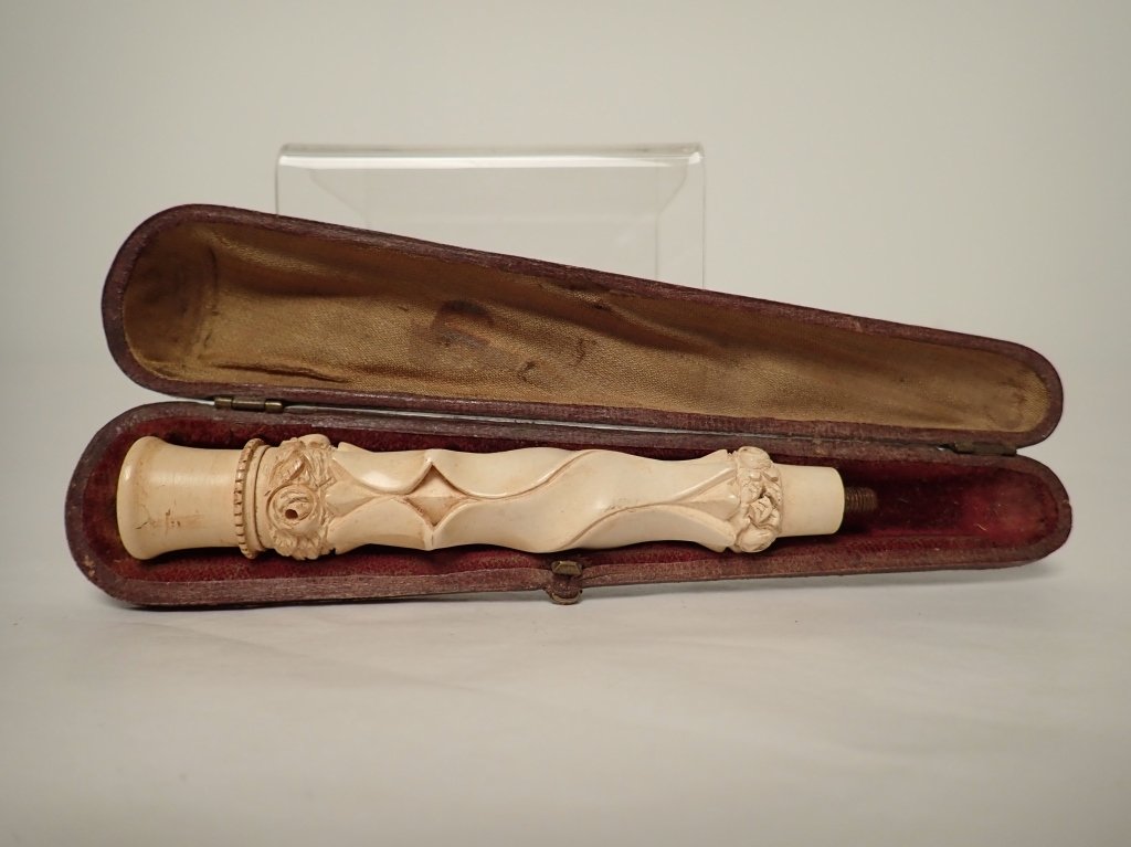 Meerschaum Cigar Holder with Carved Spiral Design: From the Estate of Marty Prail. Antique meerschaum cigar/cigarette holder with carved spiral design. Includes fitted case, does not include mouthpiece. Imperfections: signs of normal use, no other vis