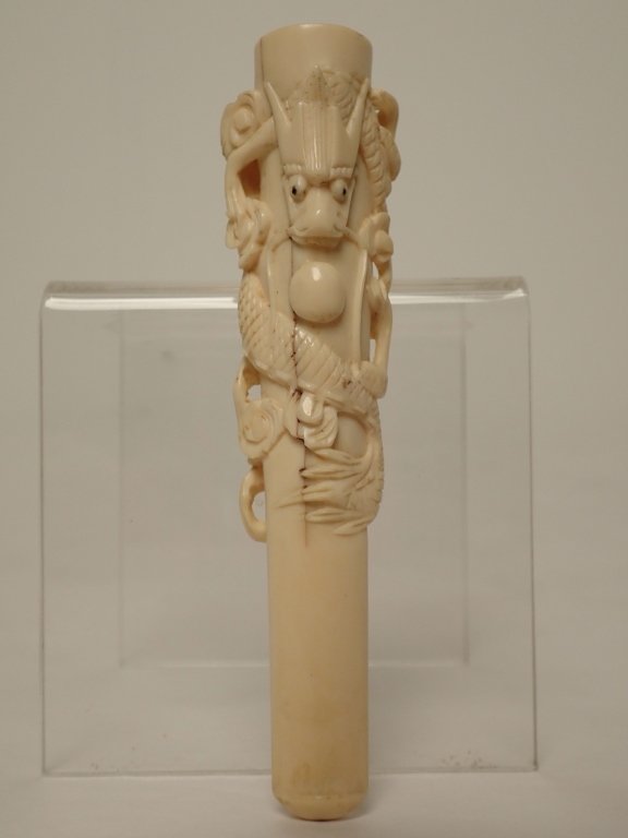 Meerschaum Cigar Holder with Dragon Totem Motif: From the Estate of Marty Prail. Antique meerschaum cigar holder with dragon totem motif. Imperfections: crack in body of piece leading to bowl end (see photos), signs of normal use, no other visible c