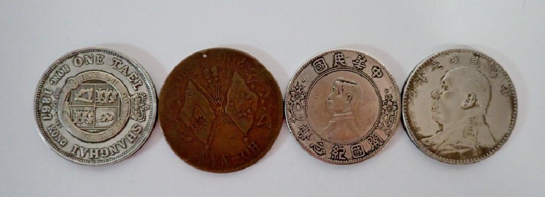Four Assorted Chinese coins (1 of 9)