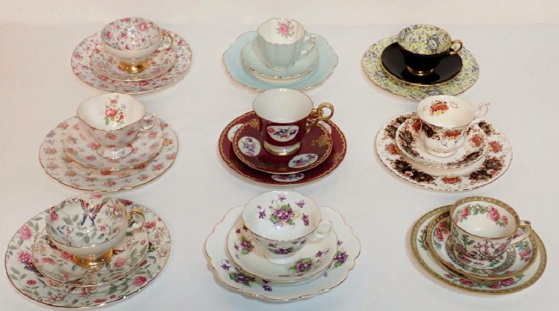 Grouping of Fine Bone China Tea Cup & Saucer Sets: Grouping of fine bone china tea cup & saucer sets with varying designs. 9 sets in total. Maker's marks include: Old Royal, H M Williamson & Sons, Shelley, Victoria C&E, Hammersley, Royal Albert, Radfo