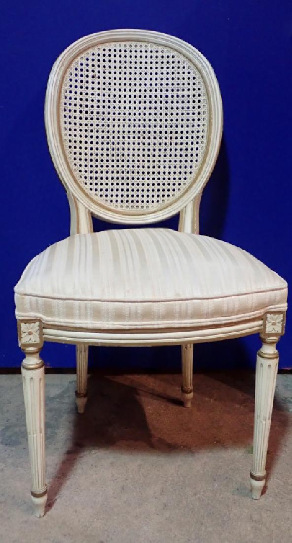 Set of 10 Wooden Upholstered Rattan Chairs: Set of Wooden Upholstered Rattan Chairs. 10 chairs in total. Imperfections. Dimensions: 37" H x 19.5" W x 18" D. (chairs, wood, seating, interior design. accent piece) STERLING ASSOCIATES STRIVES TO P