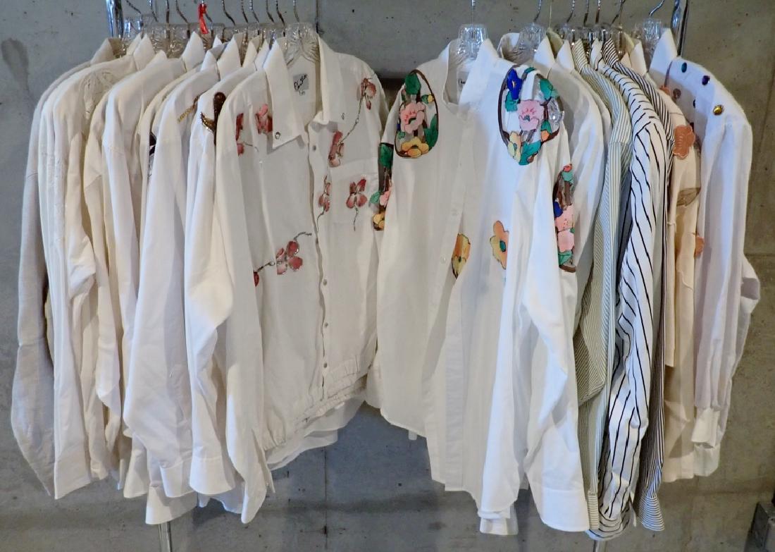 Ladies Blouses with Appliques and Cut Out Designs: From the Estate of Joyce Dankoff. 20 assorted vintage womens blouses in various sizes and styles. Shirts feature cut-outs, applied designs and more. Labels include: Marquis, Belle Femme by Sandra Trou