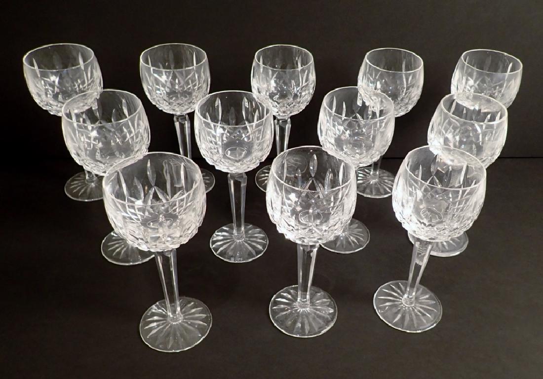 Waterford Lismore Hock Wine Glasses Set of 12: Wine Hock in Lismore pattern by WATERFORD. Makers marks on bottoms. Some residue on bottom rims. Wear to some makers marks. Height: 7 1/2"; Diameter: 2 3/4". (Crystal. serving ware, entertaining) STER