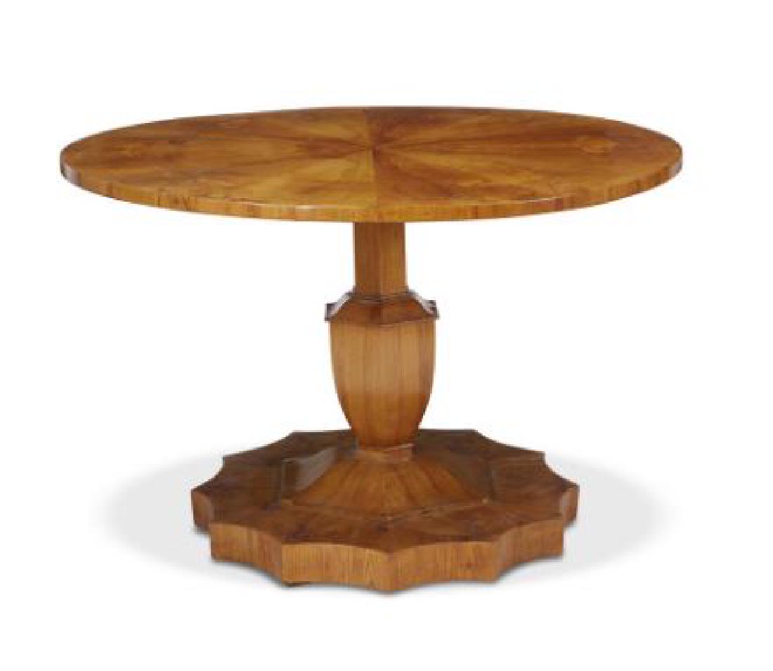 19th C Biedermeier Walnut Tilt Top Table: A Biedermeier walnut veneered pedestal center table Flip top design. South German, circa 1830 The round top with kaleidosopic bookmatched walnut veneer on tilt-top mechanism mounted above a hexagonal 