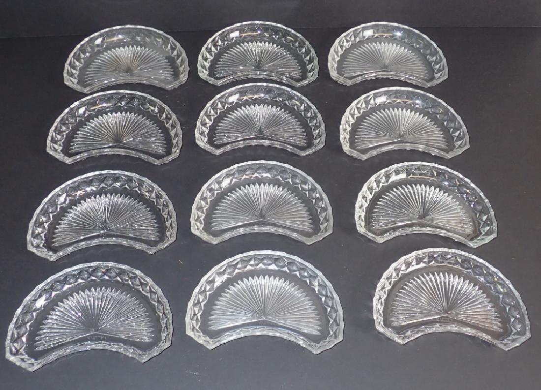 Val St Lambert Cut Glass Bone Dishes, Set of 12: Crescent shaped cut crystal dish set. Each piece is signed Val St Lambert. Height: 1"; Width: 7 1/2". Depth: 5 1//2". (Serving ware, side salad plate, vintage, antique)STERLING ASSOCIATES STRIVES TO P