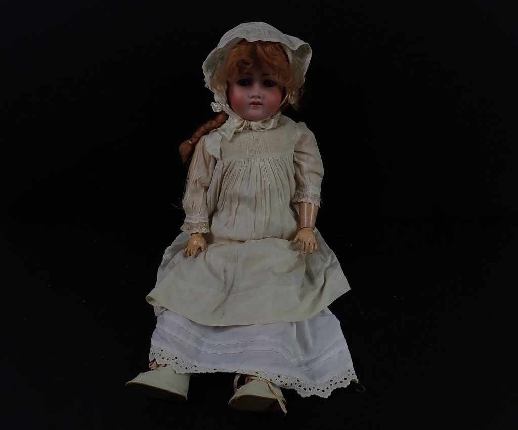 C. M. Bergmann Simon and Halbig Porcelain Doll: Early 1900's Marked German - made C. M. Bergmann Simon and Halbig Bisque Porcelain Composition Doll, "C M BERGMANN SIMON & HALBIG S & H" marked on back of neck, sleeping blue eyes and red braided wig,