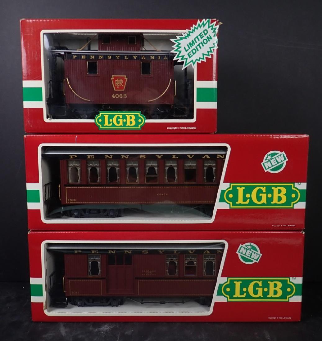 Lot of 3 LGB Pennsylvania R.R. Passenger Cars: Lot includes: Three LGB (Lehmann Gross Bahn) Model Train Passenger Cars, Pennsylvania Railroad, Model Numbers: 4065 - E 03, 3280, 3281, made in W. Germany (West Germany). All come in original packagin